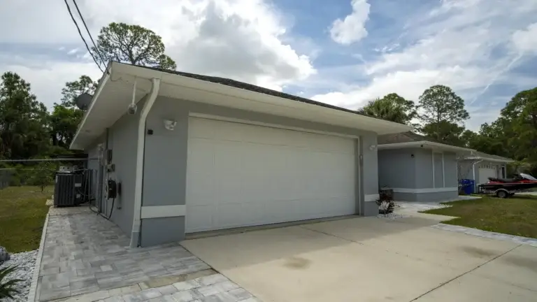House garage with concrete driveway exterior