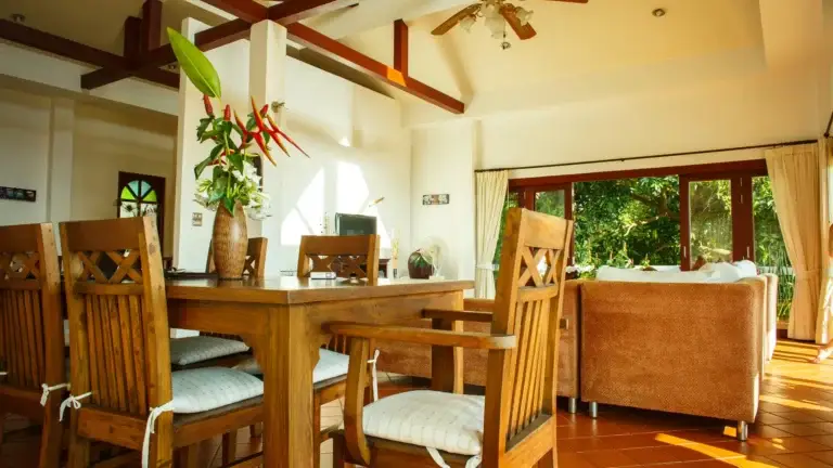 Wooden dining table in summer living room
